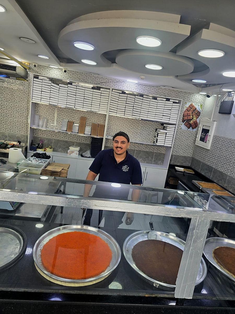 Our team behind the kunafa trays