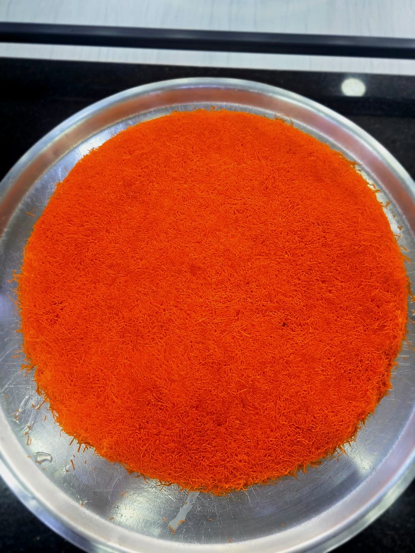A real orange khishneh tray just after the flip
